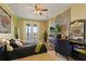Bedroom with lake view, king-size bed, and stylish decor at 6019 Linneal Beach Dr, Apopka, FL 32703