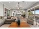 Relaxing living room with open floor plan and view of lake at 6019 Linneal Beach Dr, Apopka, FL 32703