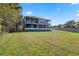 House with large backyard and view of the lake at 6019 Linneal Beach Dr, Apopka, FL 32703