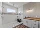Large bathroom with a walk-in shower, granite countertop, and modern design at 6019 Linneal Beach Dr, Apopka, FL 32703