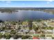 Aerial view showing home's location by the lake at 6019 Linneal Beach Dr, Apopka, FL 32703