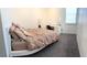 Spacious bedroom with a large bed and workspace at 4749 Riverwalk Dr, St Cloud, FL 34771