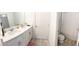 Clean bathroom with double vanity and separate toilet area at 4749 Riverwalk Dr, St Cloud, FL 34771