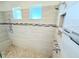 Walk-in shower with multiple shower heads at 4749 Riverwalk Dr, St Cloud, FL 34771