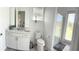 Modern bathroom with walk-in shower and updated vanity at 4749 Riverwalk Dr, St Cloud, FL 34771
