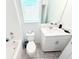 Clean bathroom with white vanity and bathtub at 4749 Riverwalk Dr, St Cloud, FL 34771