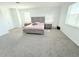 Main bedroom with ample space and plush bed at 4749 Riverwalk Dr, St Cloud, FL 34771
