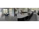 Modern kitchen with white cabinets, large island, and stainless steel appliances at 4749 Riverwalk Dr, St Cloud, FL 34771