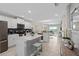 Modern kitchen with island and stainless steel appliances at 3131 Paradox Circle 204 # 204, Kissimmee, FL 34746