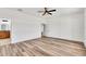 Spacious bedroom with ceiling fan and an ensuite bathroom at 4765 Hickory Tree Rd, Saint Cloud, FL 34772