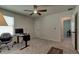 Bright home office with a desk and chair, near another room at 4009 Winding Meadows St, Apopka, FL 32712