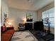 Home office with built-in desk, comfortable seating and large window at 4009 Winding Meadows St, Apopka, FL 32712