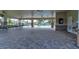 Spacious pool area with covered seating and a brick-paved deck at 4009 Winding Meadows St, Apopka, FL 32712