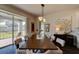 Spacious dining room with sliding glass doors leading to the backyard at 4009 Winding Meadows St, Apopka, FL 32712