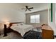 Spacious bedroom with a king-size bed and mid-century modern furniture at 4009 Winding Meadows St, Apopka, FL 32712