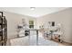 Home office with standing desk and built-in shelving at 521 Morgan Wood Dr, Deland, FL 32724