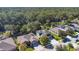 Aerial view of homes with solar panels at 521 Morgan Wood Dr, Deland, FL 32724