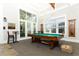 Community game room featuring a pool table and seating at 1400 Celebration Ave # 303, Celebration, FL 34747