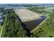 Aerial view of community with pond and homes at 1173 Basalt Ln, Sanford, FL 32771