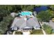 Resort-style community pool with lounge chairs and landscaping at 14494 Whittridge Dr, Winter Garden, FL 34787