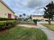 View of community playground and residential buildings at 2878 Club Cortile Cir # A, Kissimmee, FL 34746