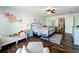 Spacious bedroom with hardwood floors and stylish decor at 643 Underwood Cv, Casselberry, FL 32707