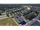 Wide aerial view of the community, showcasing the neighborhood and its surroundings at 643 Underwood Cv, Casselberry, FL 32707