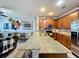 Spacious kitchen with granite countertops and modern appliances at 643 Underwood Cv, Casselberry, FL 32707