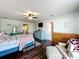 Large main bedroom with hardwood floors and ceiling fan at 643 Underwood Cv, Casselberry, FL 32707