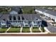 Community of townhouses viewed from above, showing building layout and landscaping at 643 Underwood Cv, Casselberry, FL 32707