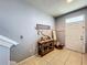 Bright and airy entryway with console table and decor at 643 Underwood Cv, Casselberry, FL 32707