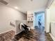 Upstairs hallway with built-in shelving and hardwood floors at 643 Underwood Cv, Casselberry, FL 32707