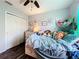 Bright bedroom with double bed, and plenty of storage at 643 Underwood Cv, Casselberry, FL 32707