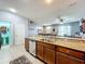 Kitchen with granite countertops, stainless steel appliances, and breakfast bar at 643 Underwood Cv, Casselberry, FL 32707