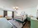Spacious bedroom with large bed, sitting area, and ample natural light at 643 Underwood Cv, Casselberry, FL 32707
