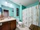 Clean bathroom with shower/tub combo and updated vanity at 643 Underwood Cv, Casselberry, FL 32707