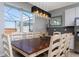 Dining area with a wooden table and six chairs at 900 Las Fuentes Dr, Kissimmee, FL 34746