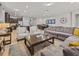 Spacious living room with a large sectional sofa and coffee table at 8832 Macapa Dr, Kissimmee, FL 34747