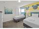 Bedroom with two twin beds and Mickey Mouse decor at 8832 Macapa Dr, Kissimmee, FL 34747