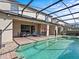 Home with private screened pool and spa at 8832 Macapa Dr, Kissimmee, FL 34747