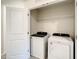 Laundry room with washer and dryer, and ample shelving at 2865 Clever Ln, Winter Park, FL 32792