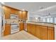 Updated kitchen with stainless steel appliances and granite countertops at 7659 Whisper Way # 102, Reunion, FL 34747