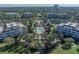An aerial view of the community, showcasing the pool and surrounding buildings at 7659 Whisper Way # 102, Reunion, FL 34747