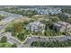 Aerial view of the building and surrounding landscape at 7659 Whisper Way # 102, Reunion, FL 34747