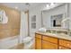 Small bathroom with a shower and vanity at 7659 Whisper Way # 102, Reunion, FL 34747