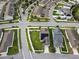 An aerial view showcasing a house with solar panels in a residential neighborhood at 6275 Hamlin Reserve Blvd, Winter Garden, FL 34787