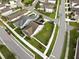 Aerial view showing a house with solar panels and a backyard in a residential area at 6275 Hamlin Reserve Blvd, Winter Garden, FL 34787
