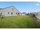 Spacious backyard with lush green grass at 6275 Hamlin Reserve Blvd, Winter Garden, FL 34787