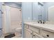 Clean bathroom with white tile, bathtub, and quartz countertop at 6275 Hamlin Reserve Blvd, Winter Garden, FL 34787