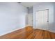 Spacious bedroom with hardwood floors and double door closet at 6275 Hamlin Reserve Blvd, Winter Garden, FL 34787
